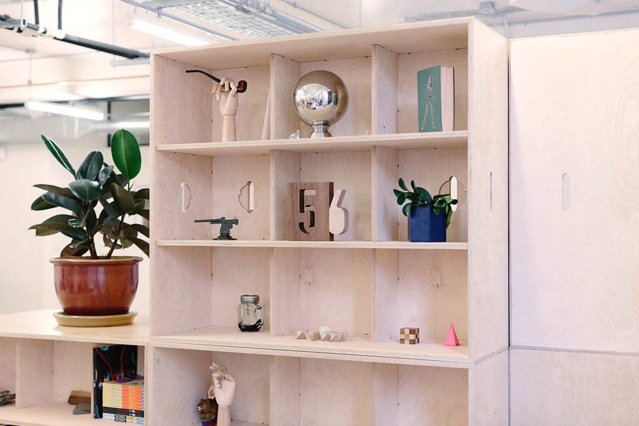 Fin Bookshelves in Black Math’s workplace
