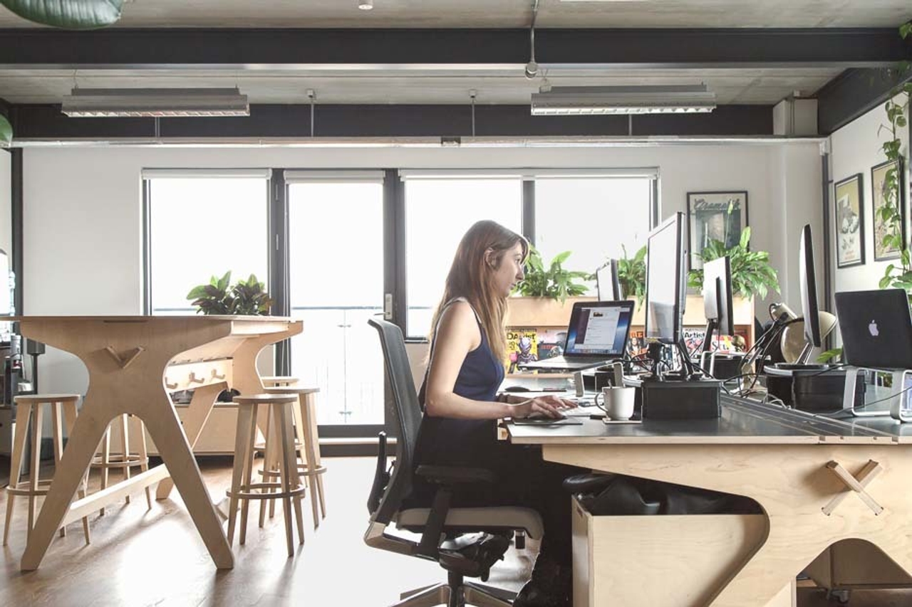 A team member working on the office Lean Desk