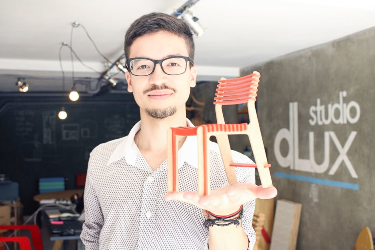Denis Fuzii with model of Valovi chair