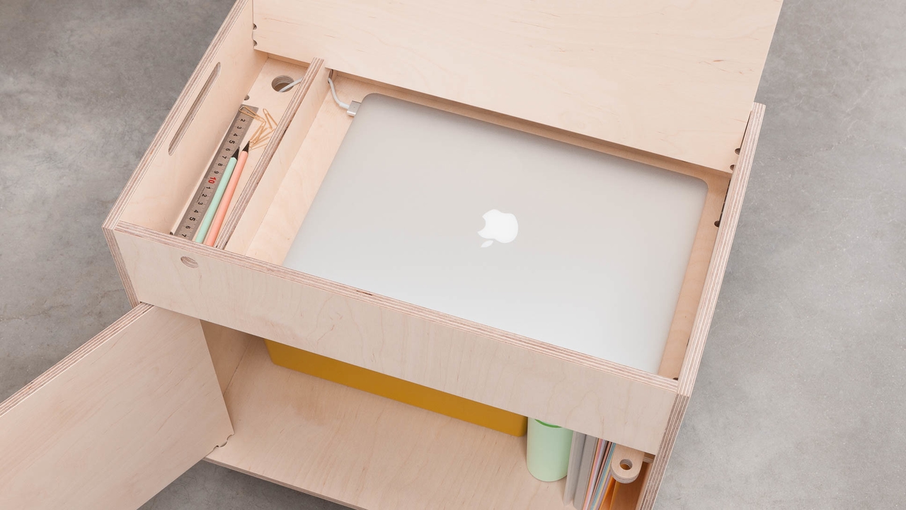 Pedestal with laptop stored in top compartment
