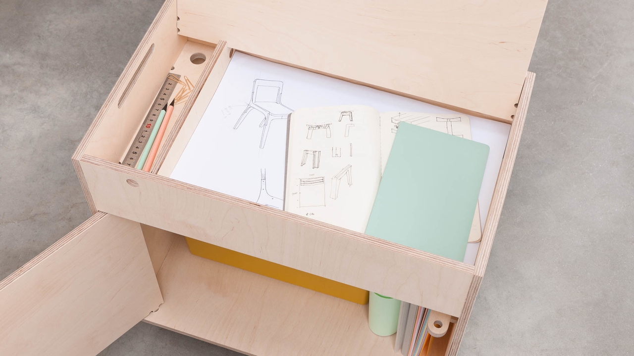 Pedestal with A3 papers, notepads and stationary stored in top compartment