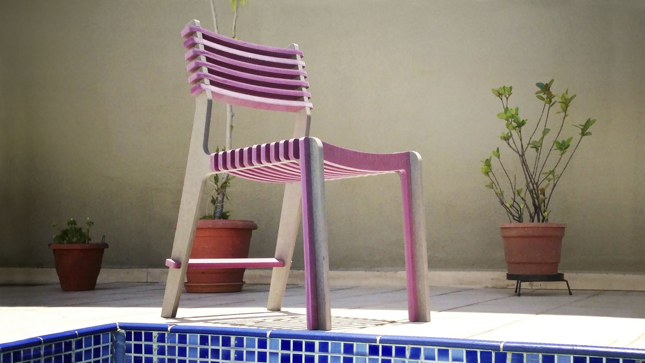 Two side view of the Valovi Chair designed for comfort in plywood by Denis Fuzii for Opendesk